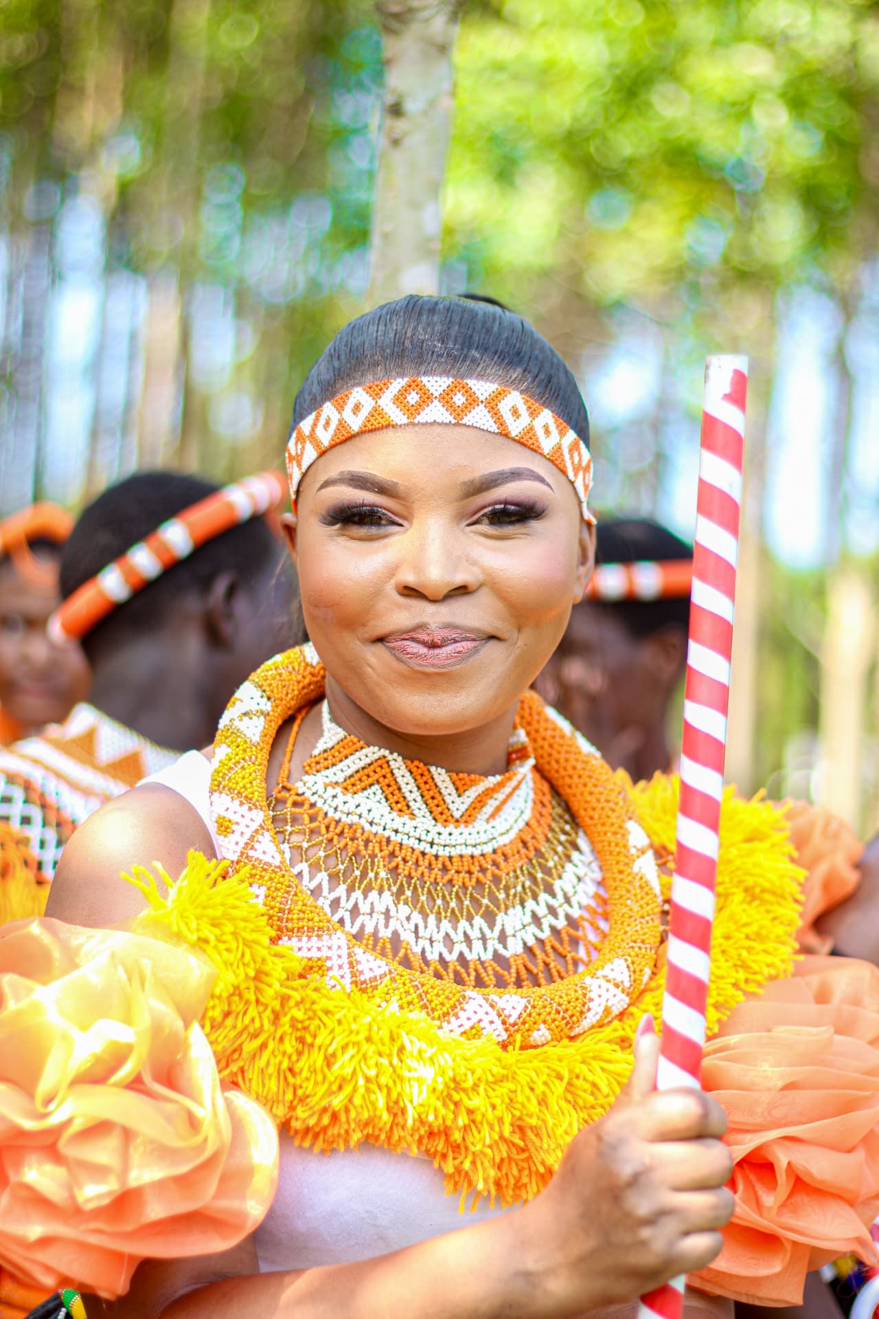 Portrait of a woman in beaded Zulu regalia during a traditional ceremony